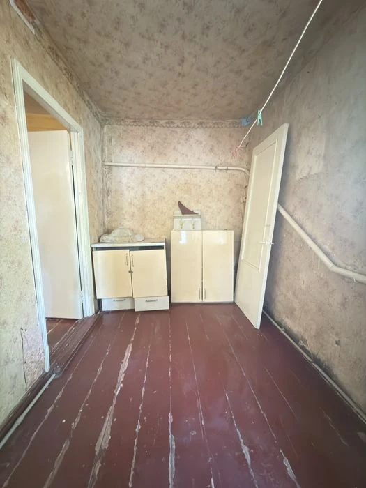 Продаж будинку на дві половини, Нова Балашівка