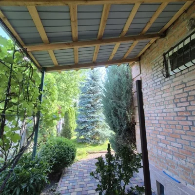 Заміський будинок  в ДК" Ятрань " з ділянкою на березі річки