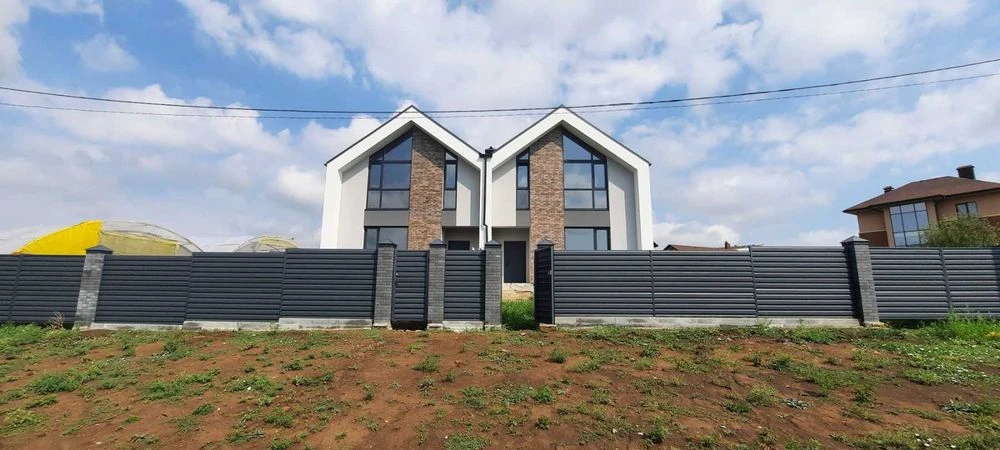 Продам стильний будинок-дуплекс з дизайнерським ремонтом