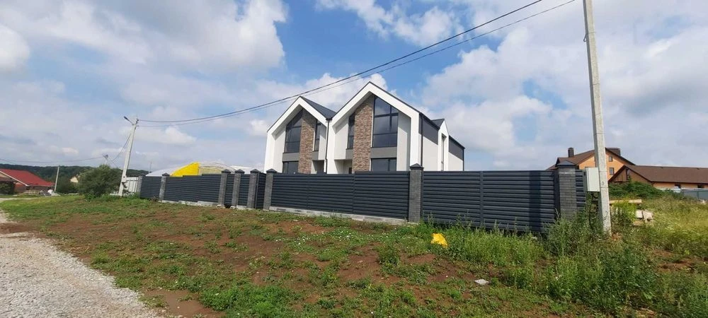 Продам стильний будинок-дуплекс з дизайнерським ремонтом