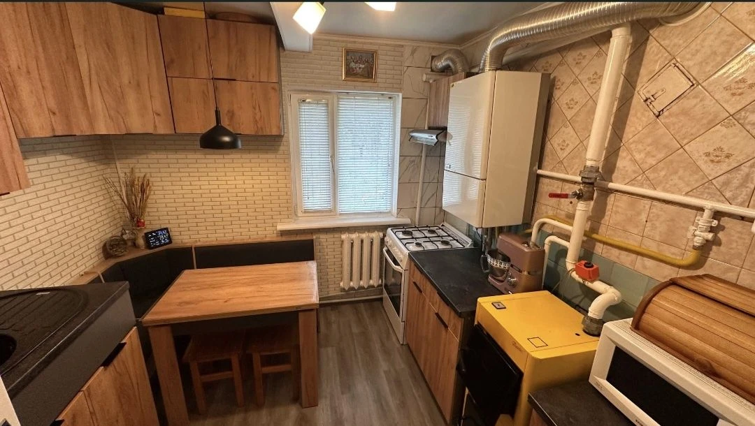 Затишний будинок 61м² з ремонтом, 15 сот, 2 котли, Крошня