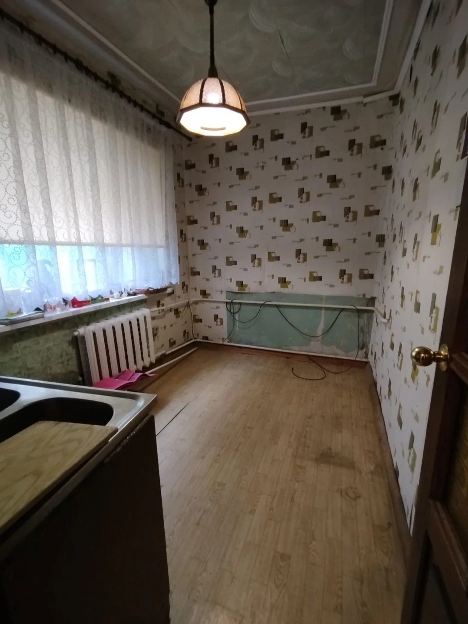 Окрема частина будинку з власним подвір'ям