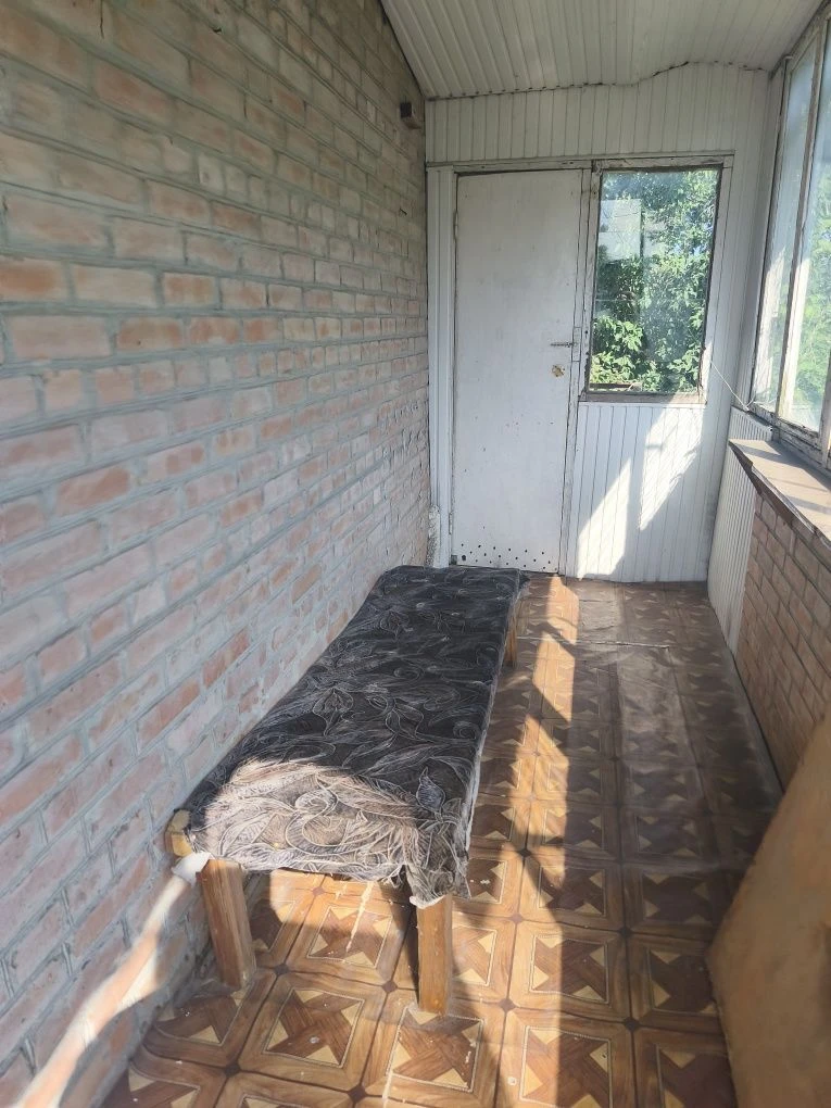 продам частину будинку.Новомиколаївка
