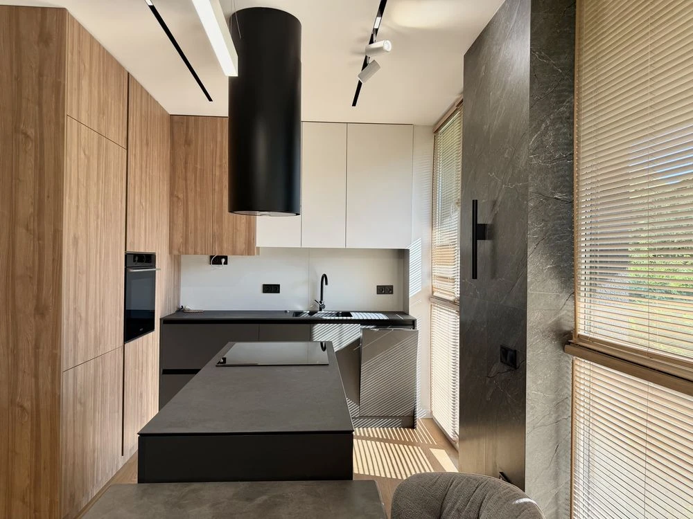Sale of a 2-room apartment with designer renovation in a modern building