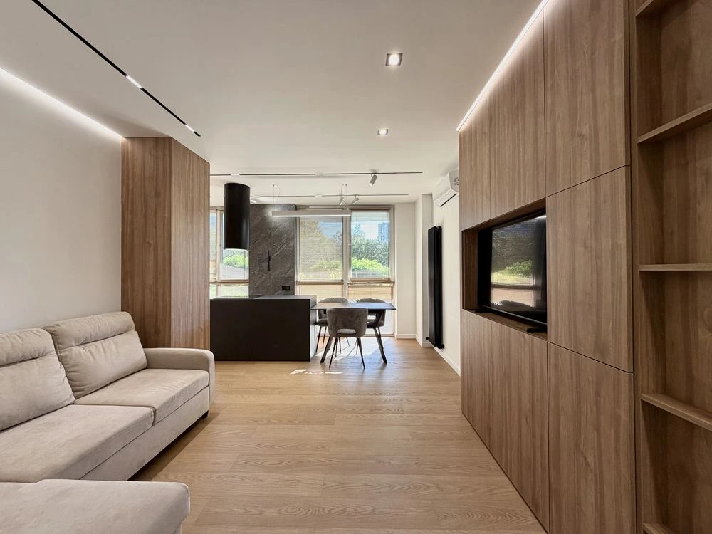 Sale of a 2-room apartment with designer renovation in a modern building