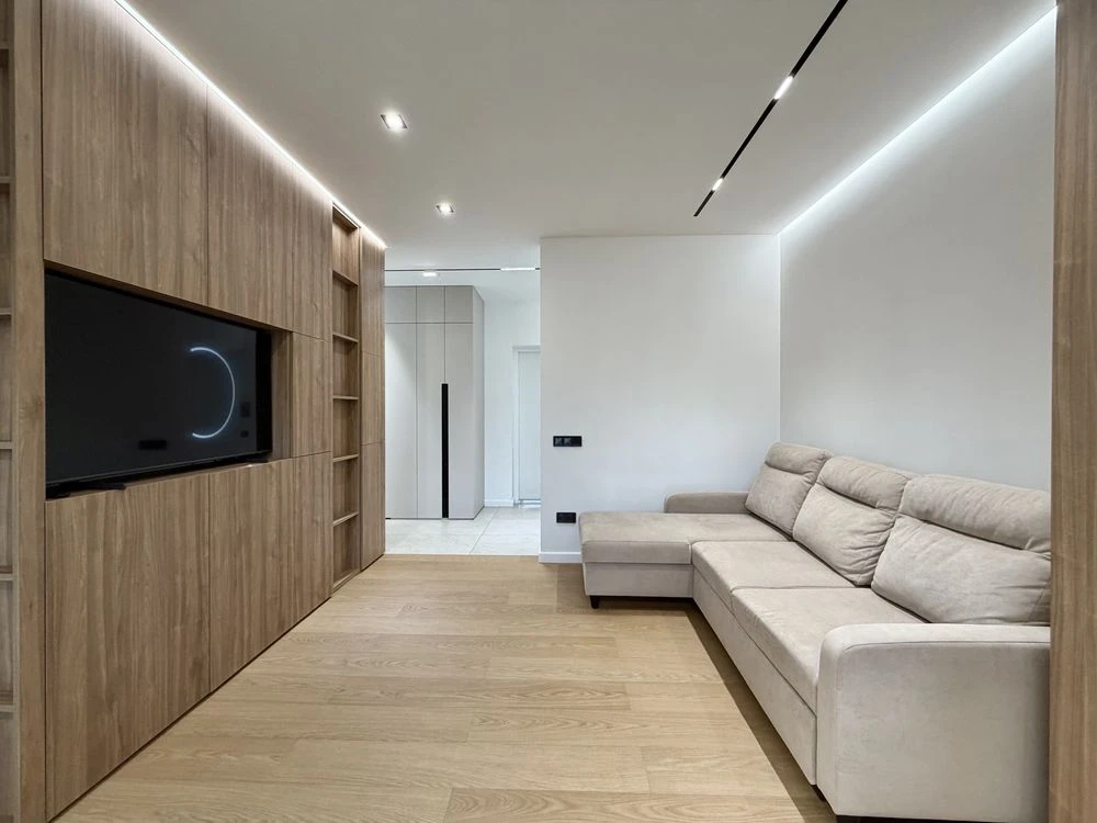 Sale of a 2-room apartment with designer renovation in a modern building