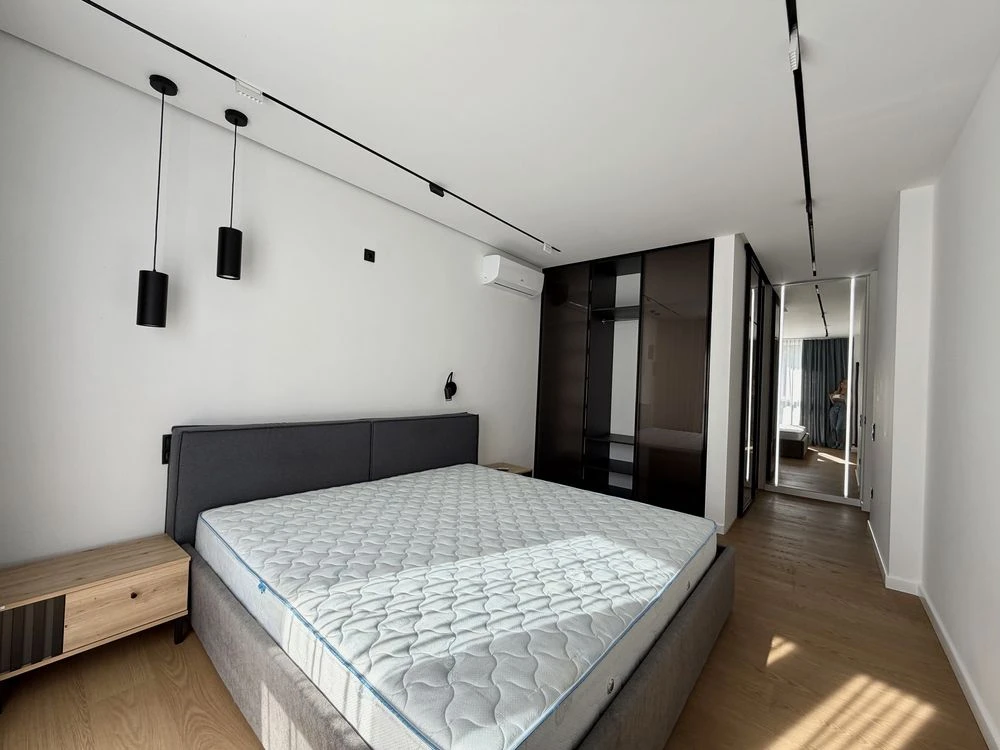 Sale of a 2-room apartment with designer renovation in a modern building