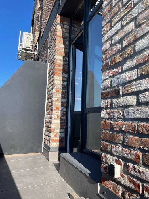 I am selling an apartment in the Loft Whitt residential complex with a terrace. Views to the west