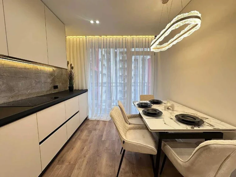 Modern apartment with a balcony near the city lake