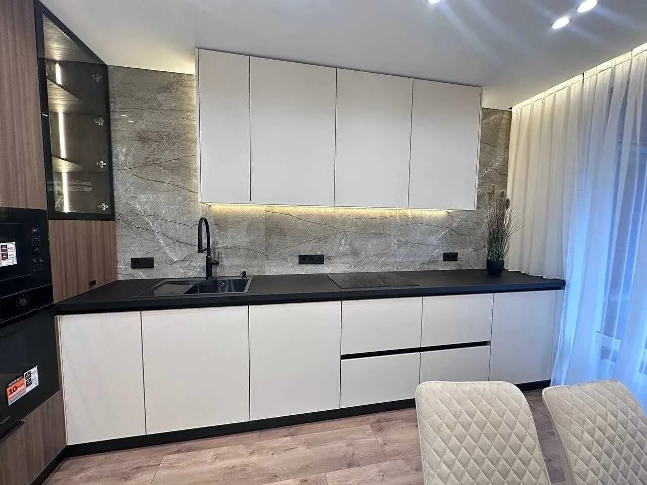 Modern apartment with a balcony near the city lake