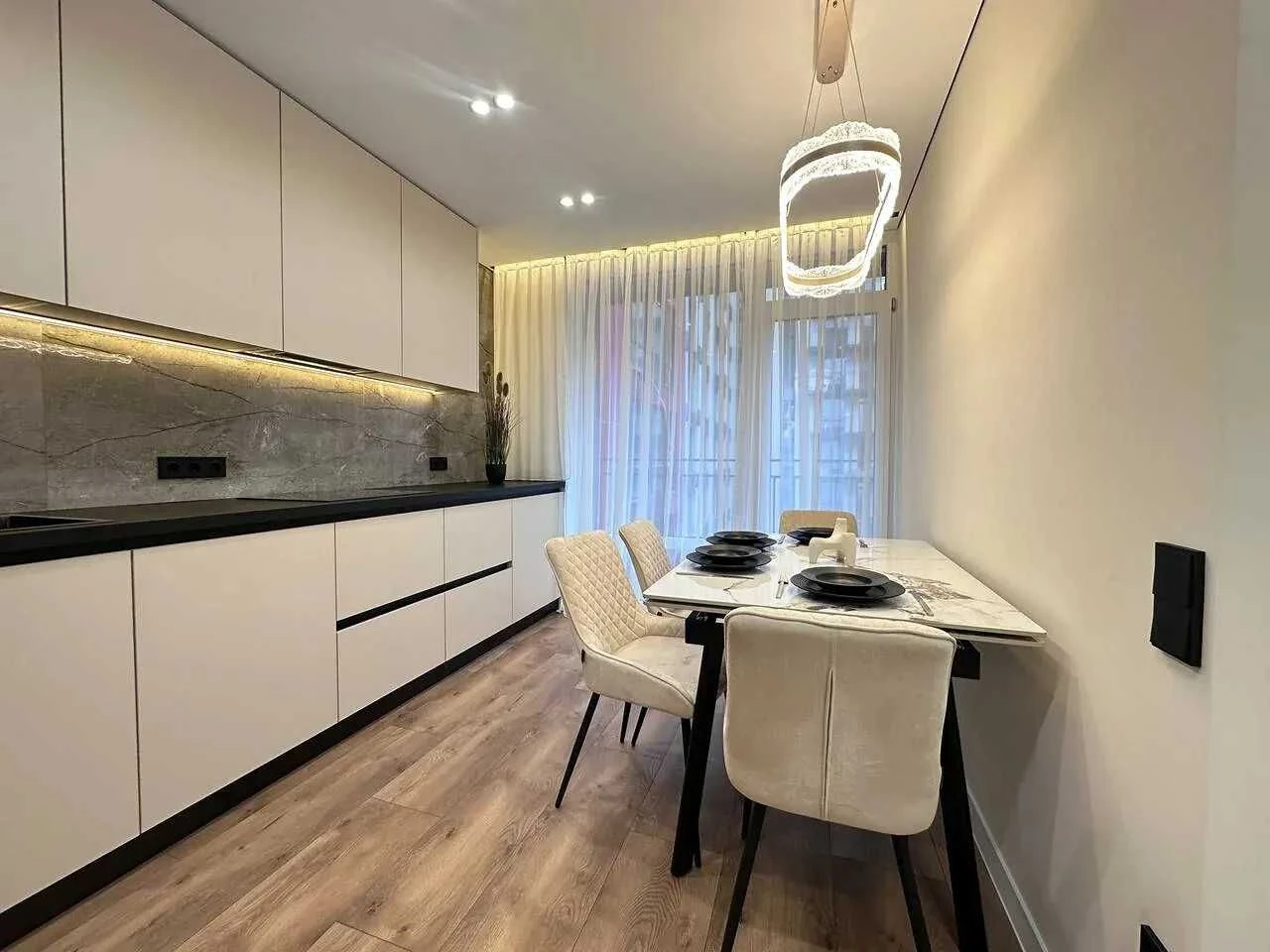 Modern apartment with a balcony near the city lake