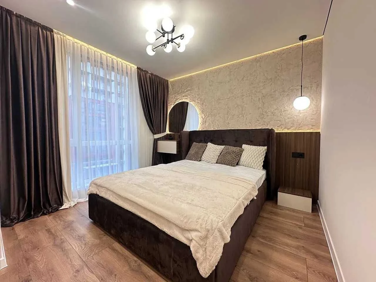 Modern apartment with a balcony near the city lake