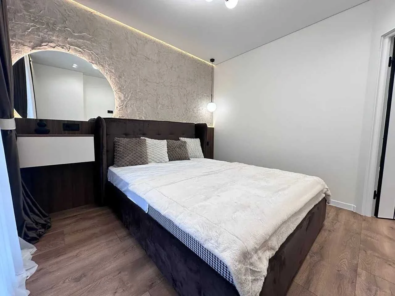 Modern apartment with a balcony near the city lake