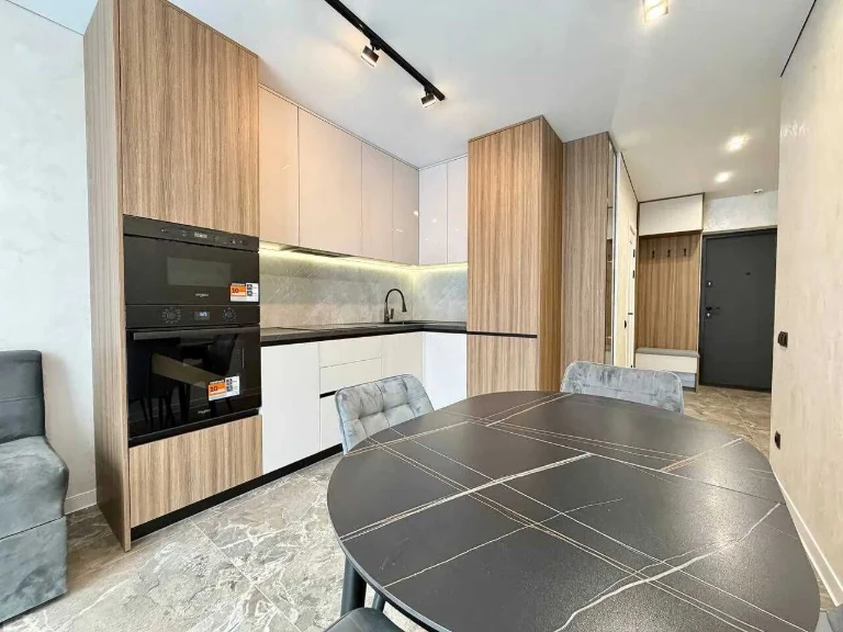 One-room apartment with renovation near the lake with a swimming pool on the ground floor