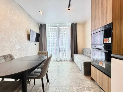 One-room apartment with renovation near the lake with a swimming pool on the ground floor