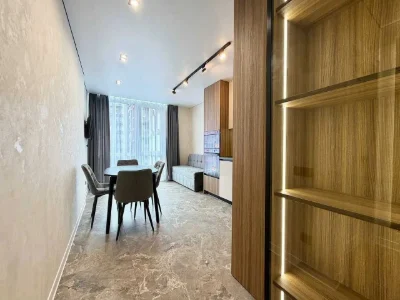 One-room apartment with renovation near the lake with a swimming pool on the ground floor