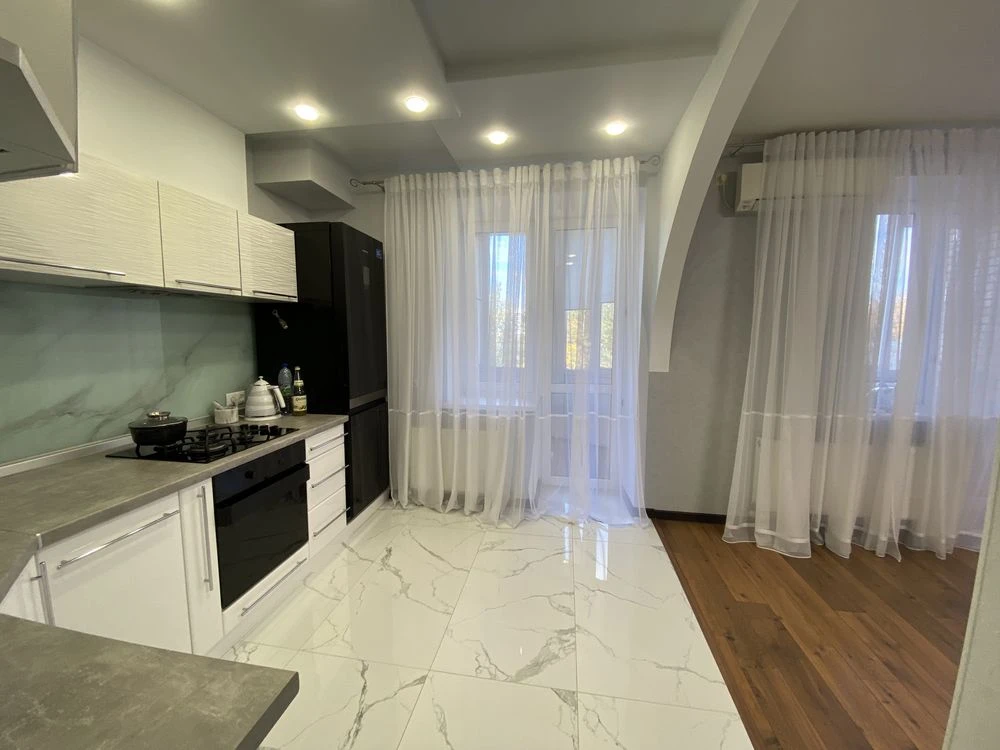 Продажа 2- уровненной стильной 4 комнатной квартиры