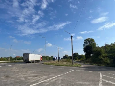Ділянка 0,47 га над трасою, перед об'їзною Рівне, район Хуті