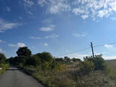 Ділянка 0,47 га над трасою, перед об'їзною Рівне, район Хуті