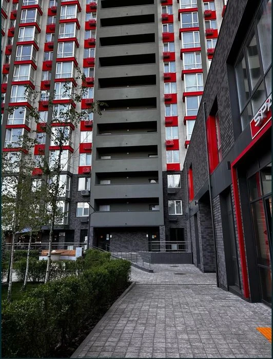 An apartment with an area of 25.40 m² is offered for sale in the residential complex 4U.