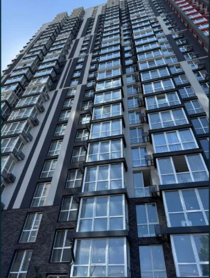An apartment with an area of 25.40 m² is offered for sale in the residential complex 4U.