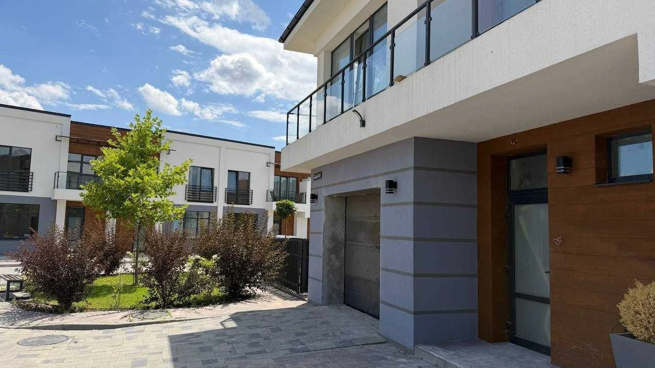 Продажа современного таунхауса - частный дом по цене квартиры