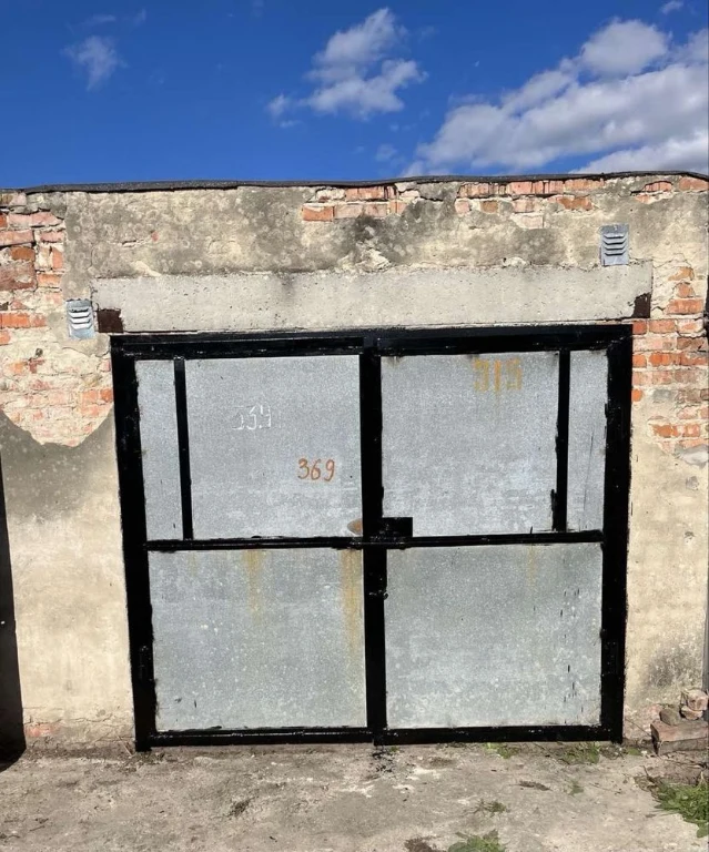 Brick Garage in the Northern Raisky Sad Cooperative "Sources"