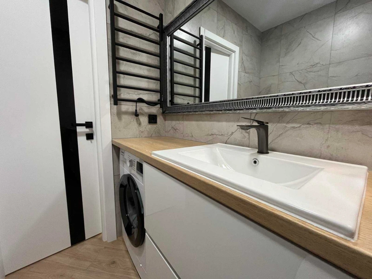 1-bedroom apartment with a view of a park area