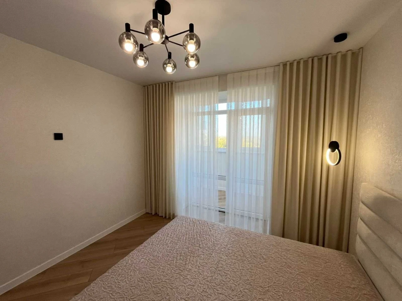 1-bedroom apartment with a view of a park area