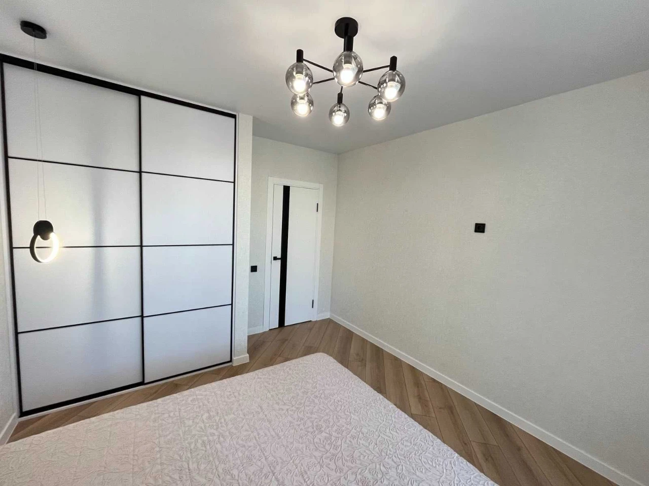 1-bedroom apartment with a view of a park area