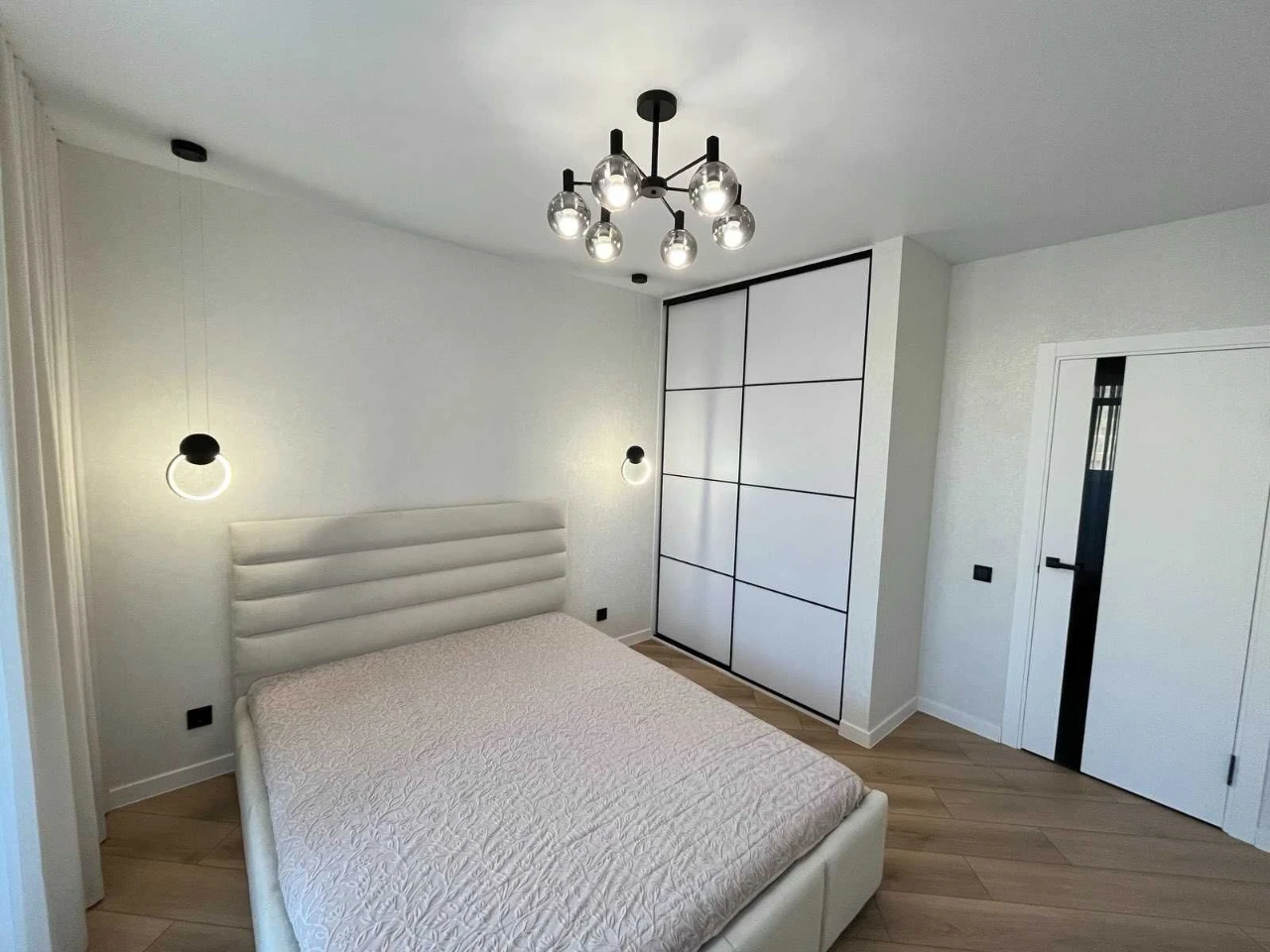 1-bedroom apartment with a view of a park area