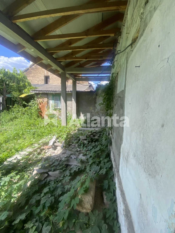 Land with building for reconstruction and agricultural buildings