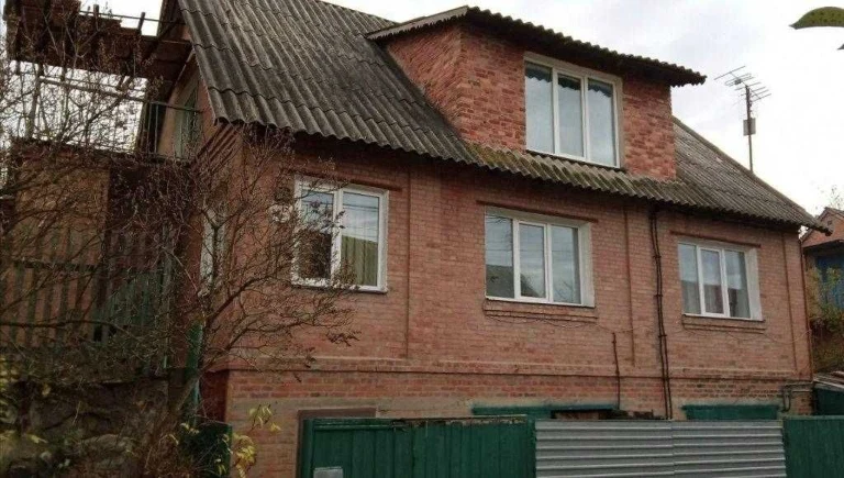 Brick two-story house for sale