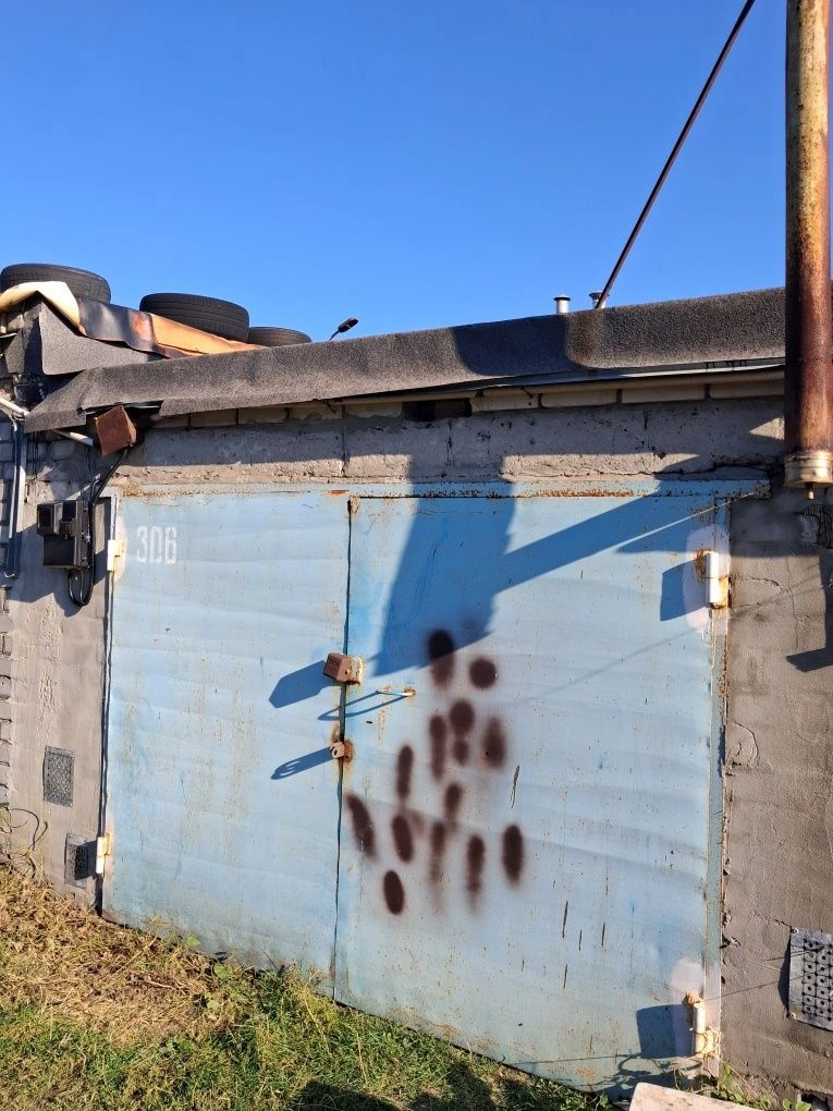 For Sale: Garage with Wood-burning Stove