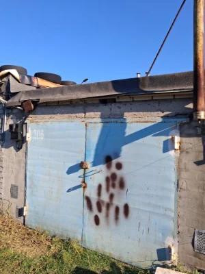 For Sale: Garage with Wood-burning Stove