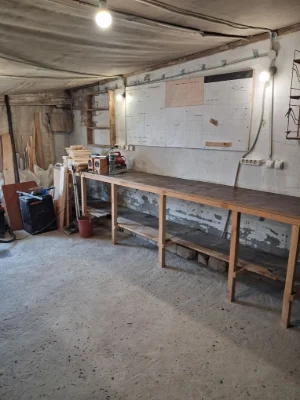 For Sale: Garage with Wood-burning Stove