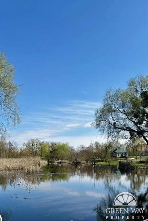 House with access to the river + plot of 10 acres