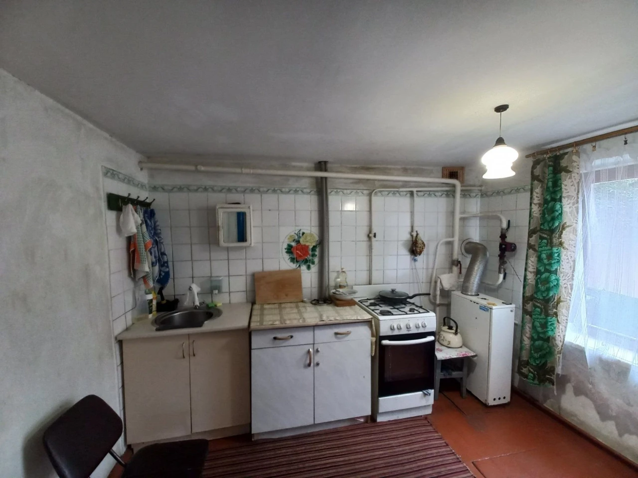 Sale of a house share with private land