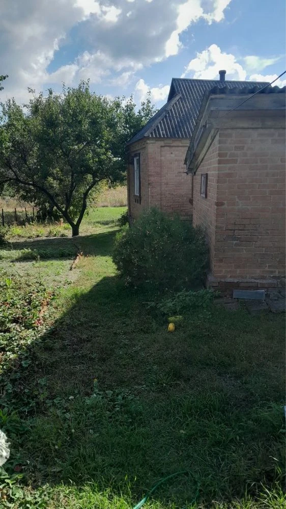 House with annex on 30.49 acres of land