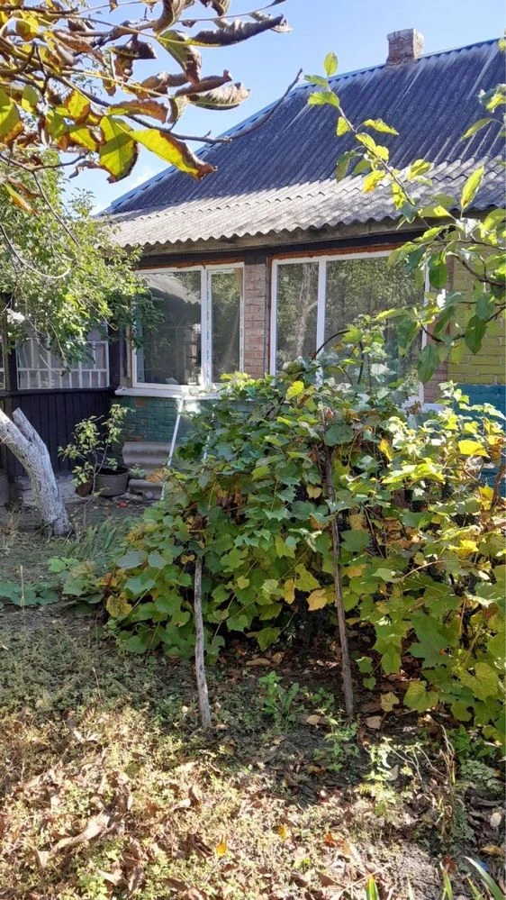House with annex on 30.49 acres of land