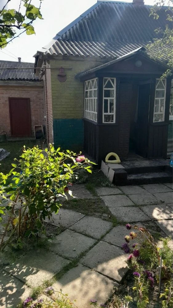 House with annex on 30.49 acres of land