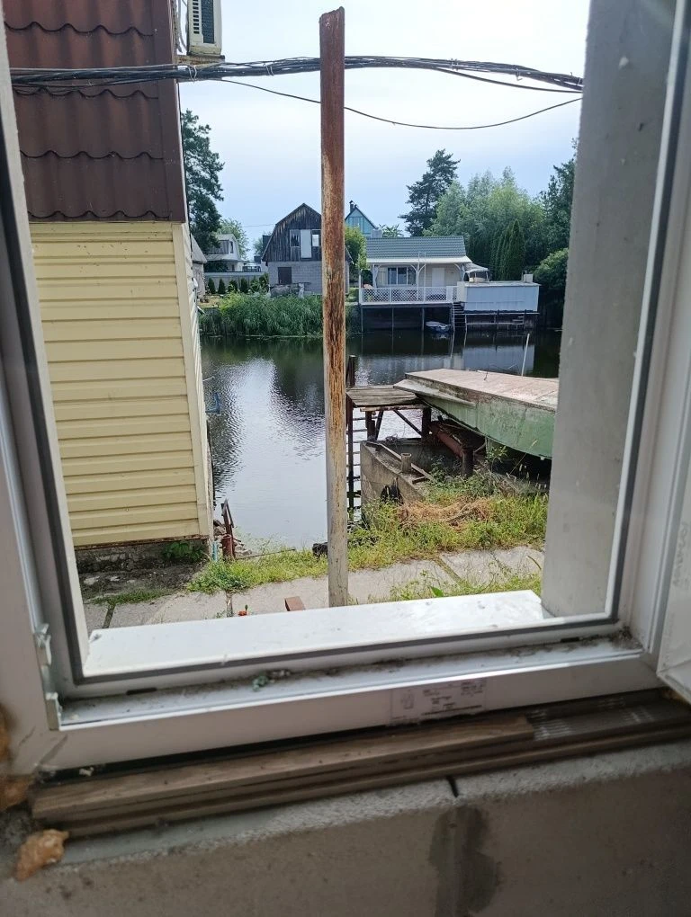 Домик на причале с собственным местом для лодки, 55 причал.