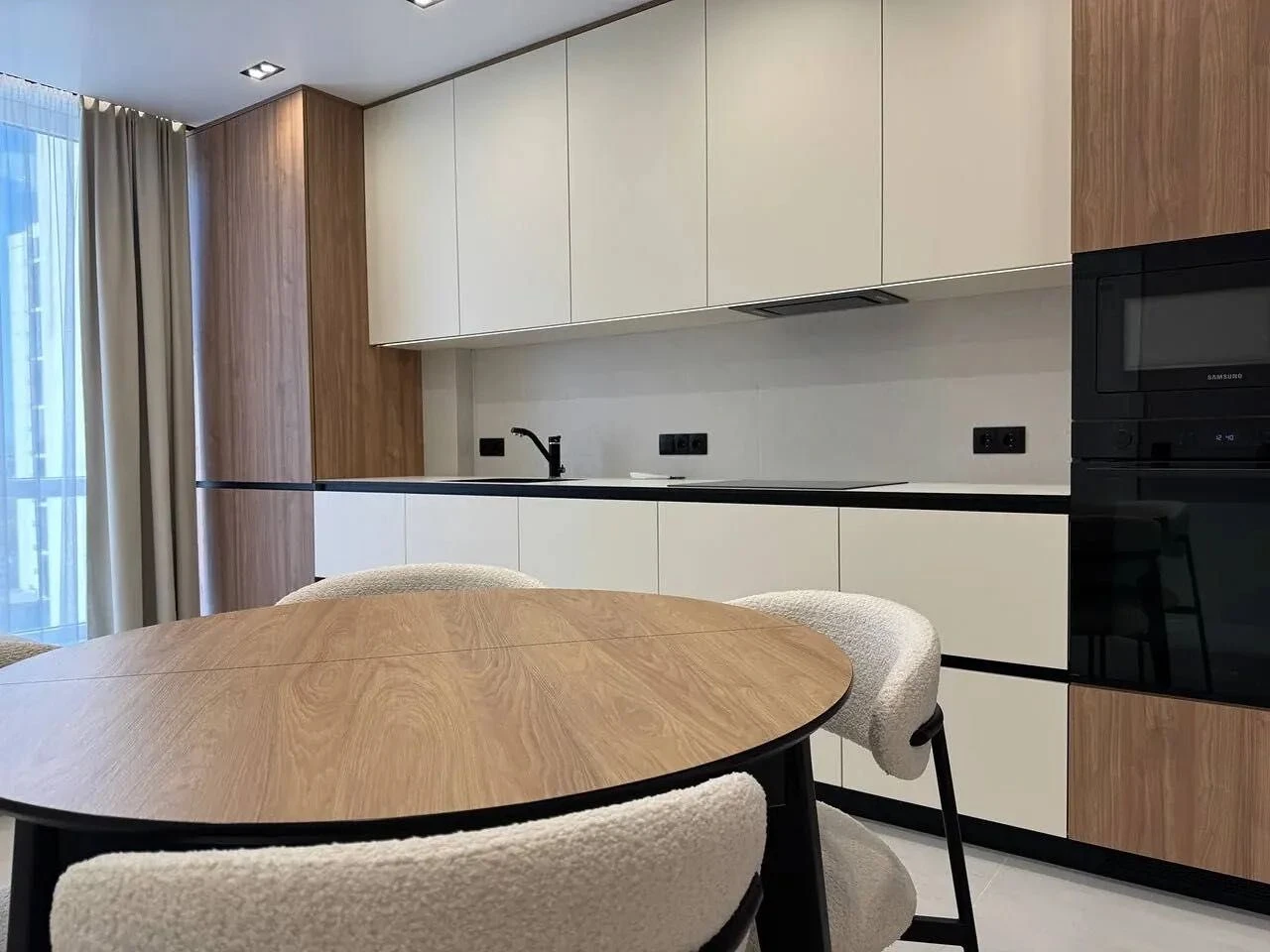 Three-bedroom apartment with a studio kitchen in the modern Manhatta residential complex