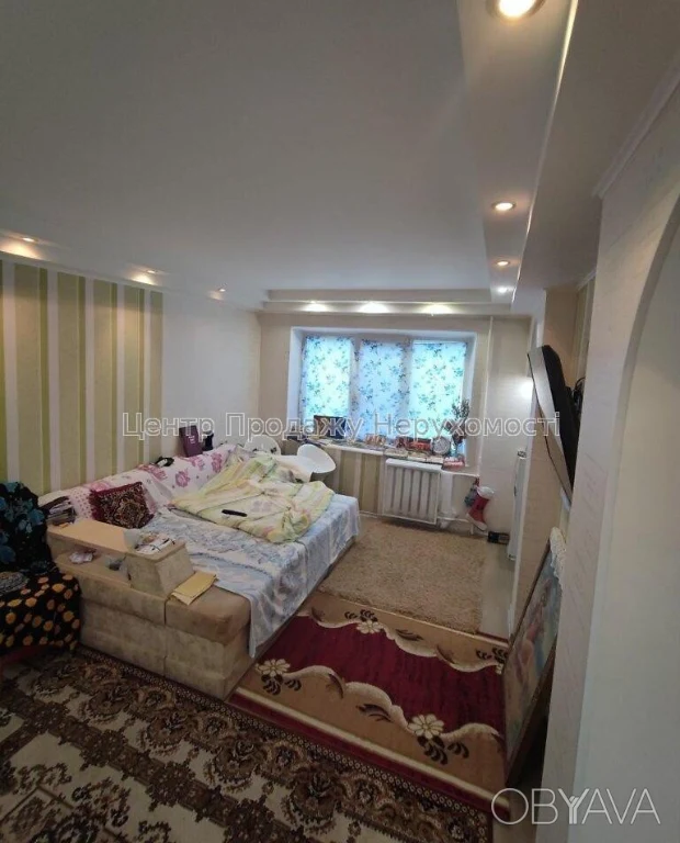 Квартира с тремя комнатами, 60 квадратных метров.