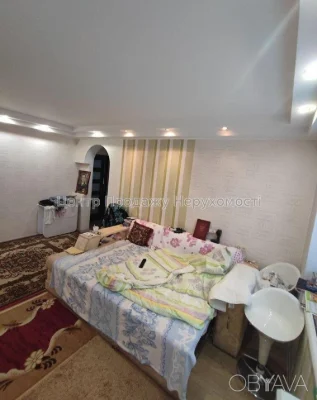 Квартира с тремя комнатами, 60 квадратных метров.
