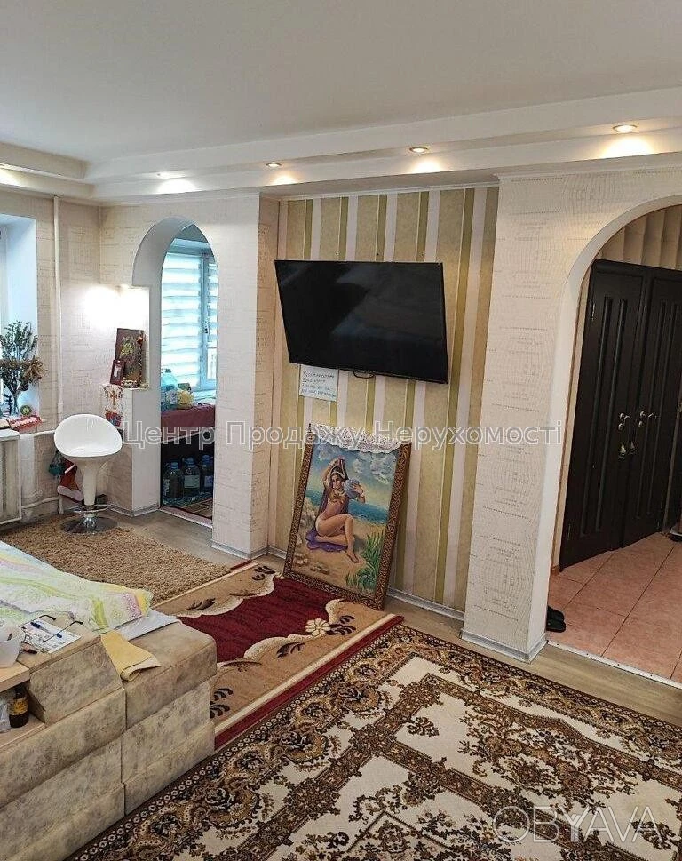 Квартира с тремя комнатами, 60 квадратных метров.