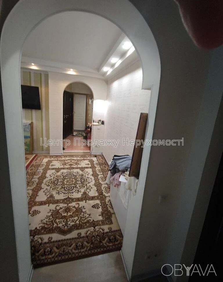 Квартира с тремя комнатами, 60 квадратных метров.