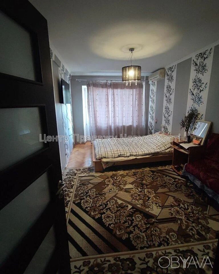 Квартира с тремя комнатами, 60 квадратных метров.