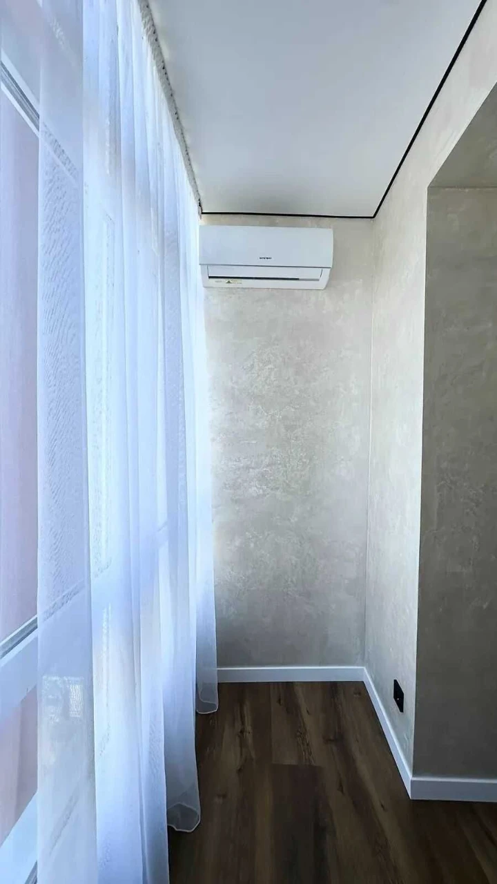 Sale of a large 2-bedroom apartment in the city center