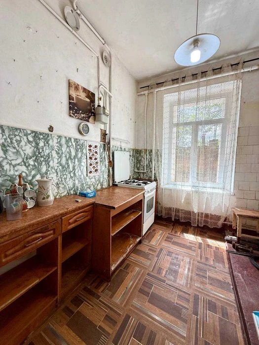 Two-room apartment for sale. Old window market